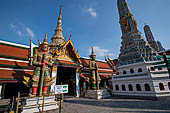 Bangkok Grand Palace, pair of giant yakshas statues the gatekeepers of the entrance of the eastern gallery with two prangs , Temple of the Emerald Buddha (Wat Phra Kaew). 
